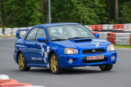 Driving behind the wheel of a Subaru Impreza on the track (1 lap)