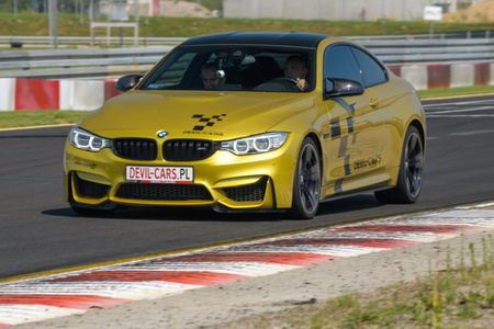 Driving behind the wheel of a BMW M4 around the track (3 laps)